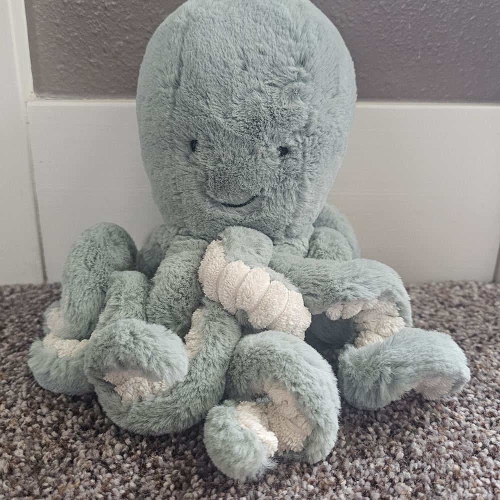 Jellycat Octopus Odyssey Retired Has Tape Over a Small Tear On Tentacle